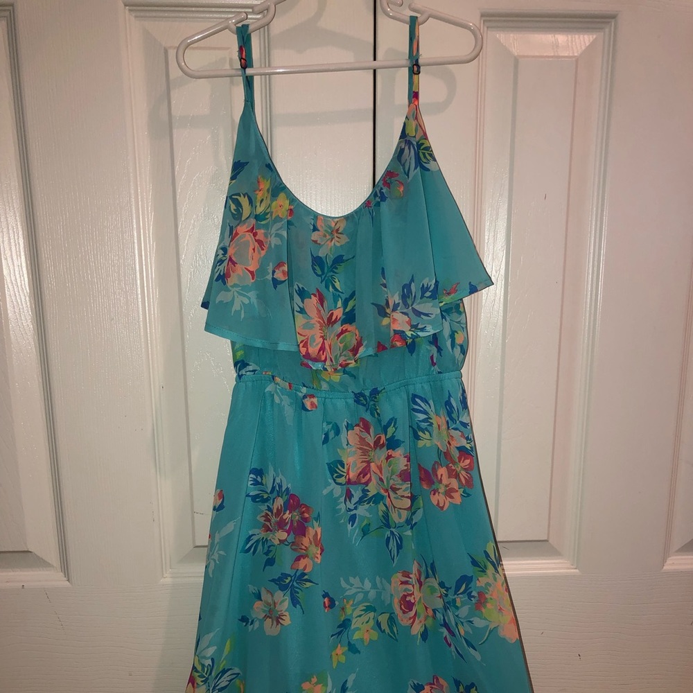 Flowers on the summer dress and flows nicely